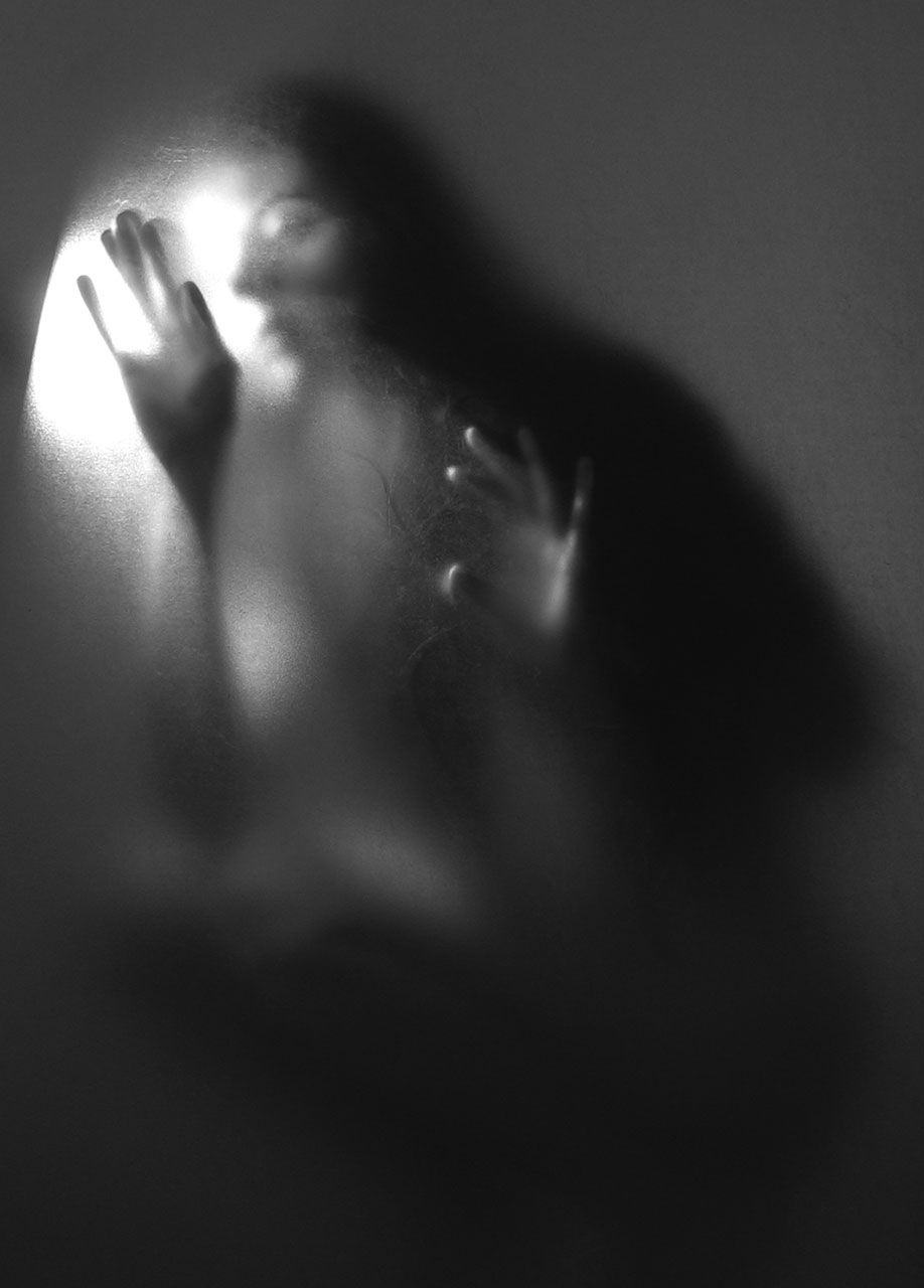 Lisa Brunner - Art Photographer - Woman trapped behind glass